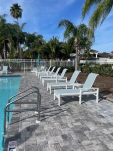 Aluminum patio loungers by the pool