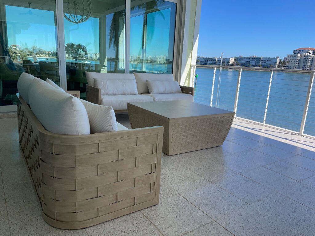 Wicker patio loungers with cushions